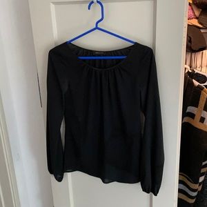BCBG sheer black blouse.